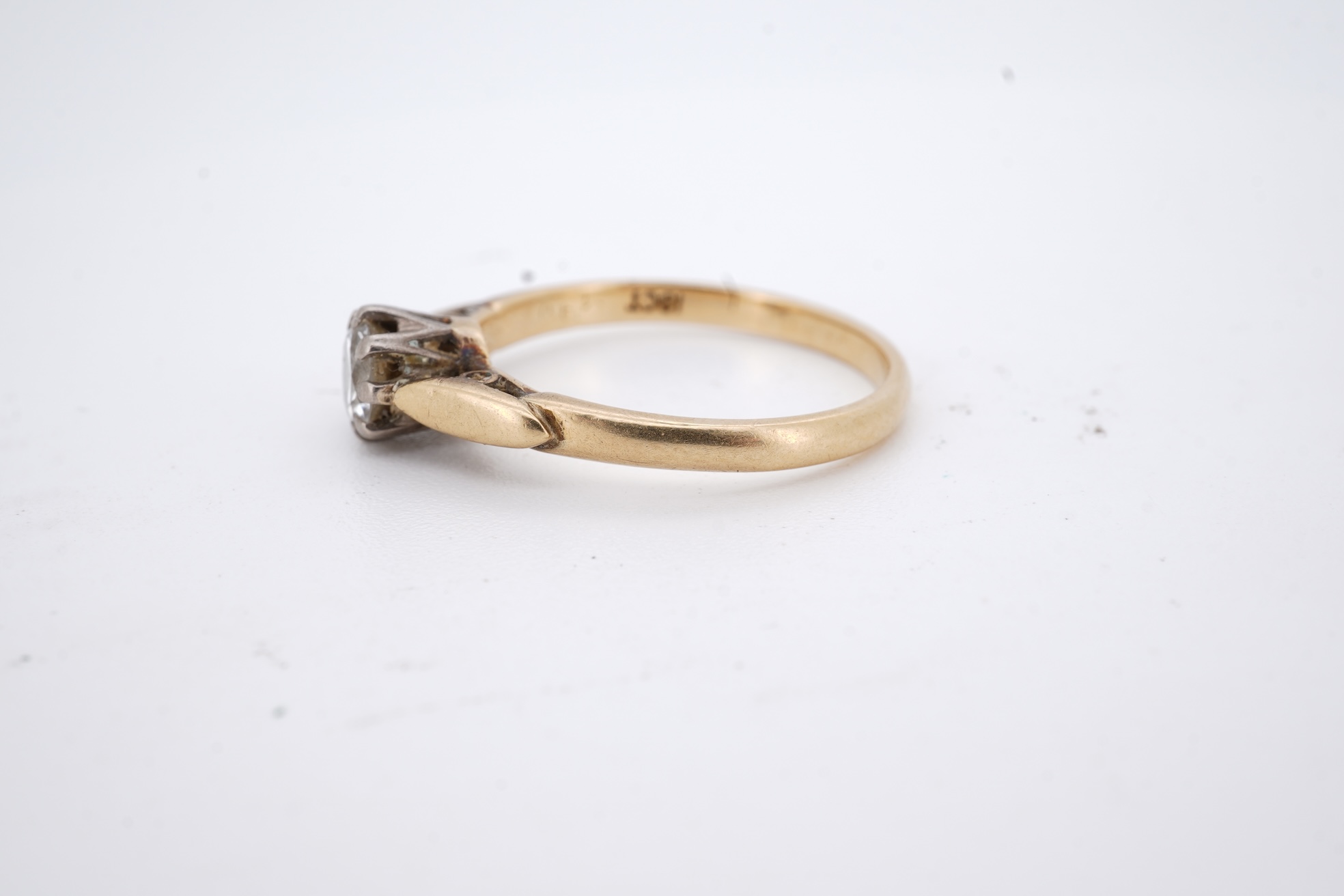 An 18ct and solitaire diamond set ring, the stone weighing approximately 0.30ct, size N, gross weight 2.8 grams.